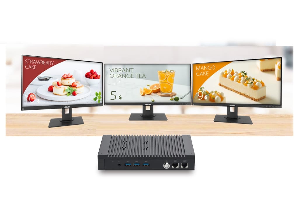 Asus Mini-PC PL64 mit drei Bildschirmen 