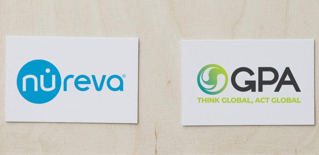 Nurava- und GPA-Logo auf Holzhintergrund