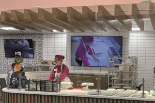 Digital Signage an Theke